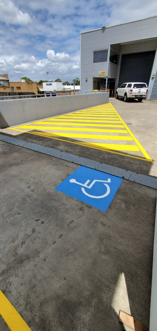 Disabled bay symbol and line marking