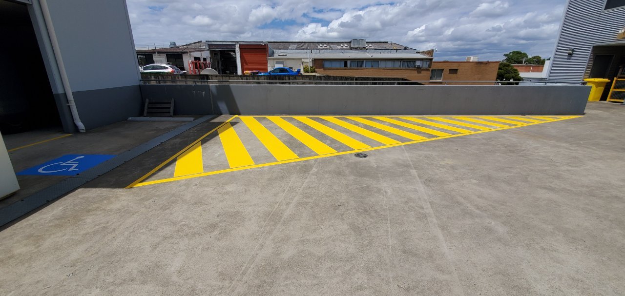 Verdi line-marking works on a Sydney rooftop car park
